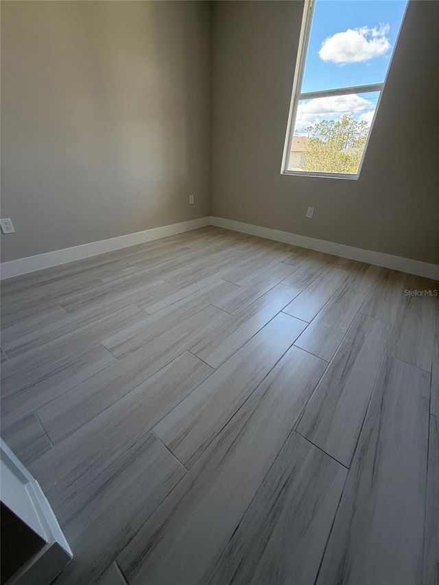 empty room featuring light hardwood / wood-style floors