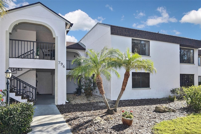 view of property exterior with a balcony