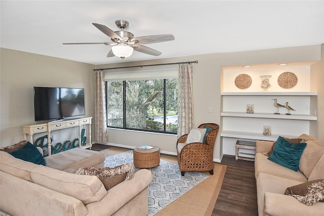 living room with hardwood / wood-style floors and ceiling fan