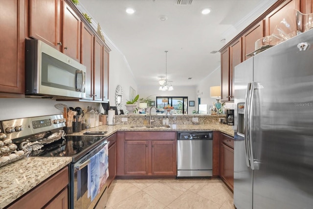 kitchen featuring stainless steel appliances, crown molding, sink, and kitchen peninsula