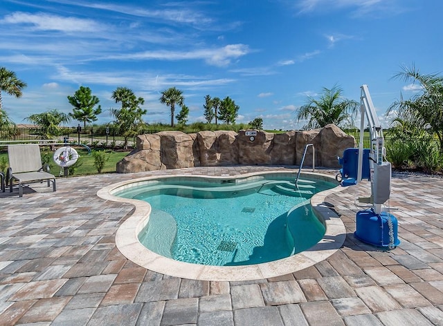 view of pool with a patio area