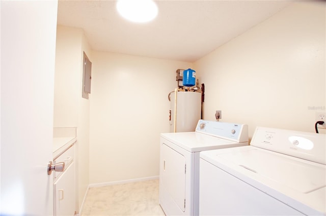 washroom featuring cabinets, washing machine and dryer, water heater, and electric panel