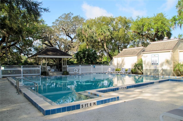 view of pool with a gazebo and a patio area