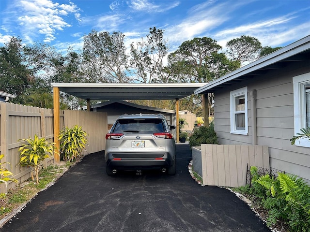 view of car parking with a carport