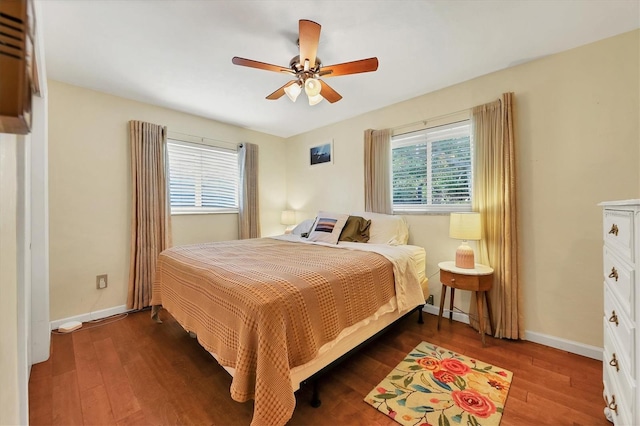 bedroom featuring hardwood / wood-style flooring and ceiling fan