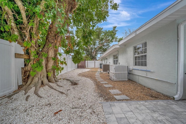 view of yard featuring central AC