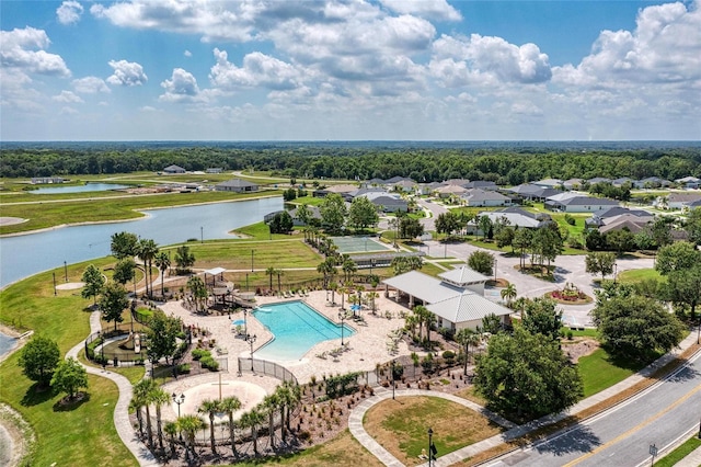 birds eye view of property featuring a water view