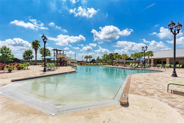 view of pool featuring a patio