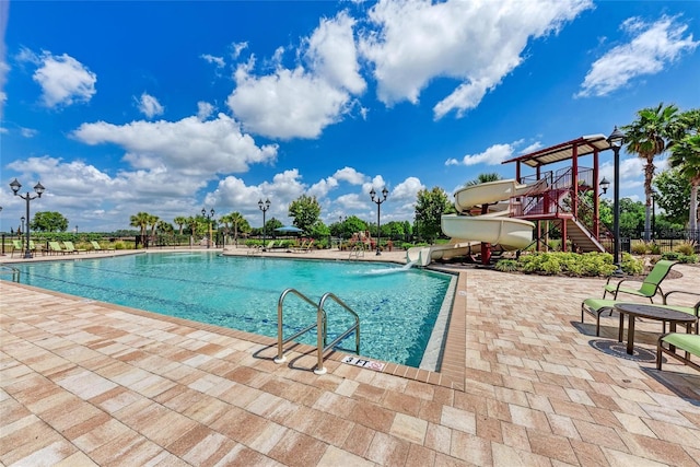 view of pool featuring a patio area