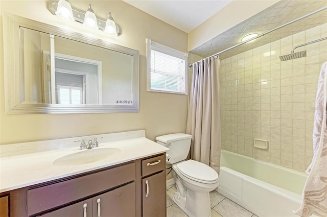 full bathroom featuring tile patterned flooring, vanity, toilet, and shower / bath combo with shower curtain