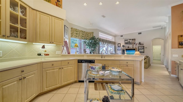 kitchen featuring light tile patterned floors, dishwasher, sink, and light brown cabinets