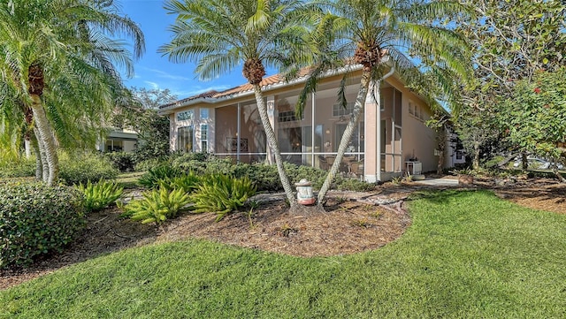 view of property exterior featuring a yard