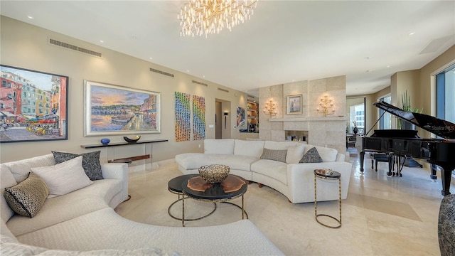 living room featuring light tile patterned flooring and a notable chandelier