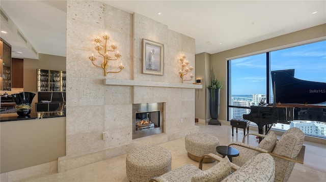 living room featuring a fireplace