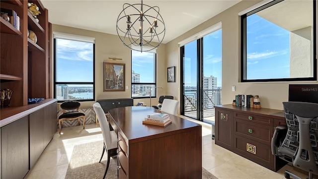 home office featuring a notable chandelier and light tile patterned flooring