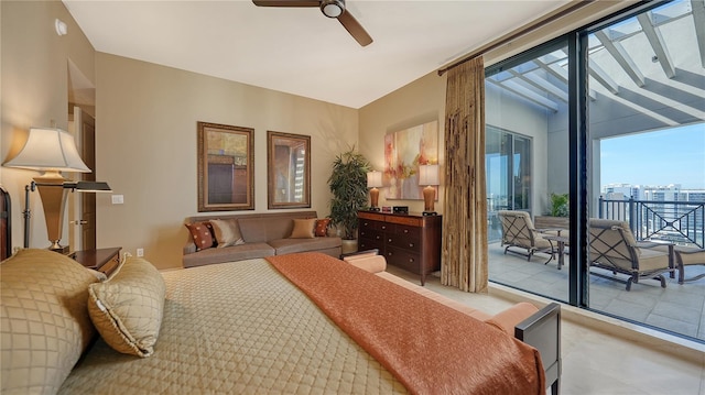 bedroom featuring ceiling fan and access to outside