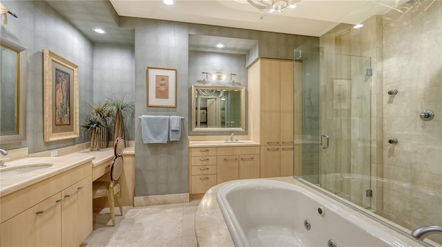 bathroom featuring vanity, tile patterned flooring, and plus walk in shower