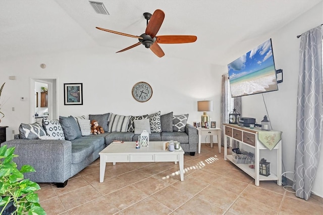 tiled living room featuring vaulted ceiling and ceiling fan