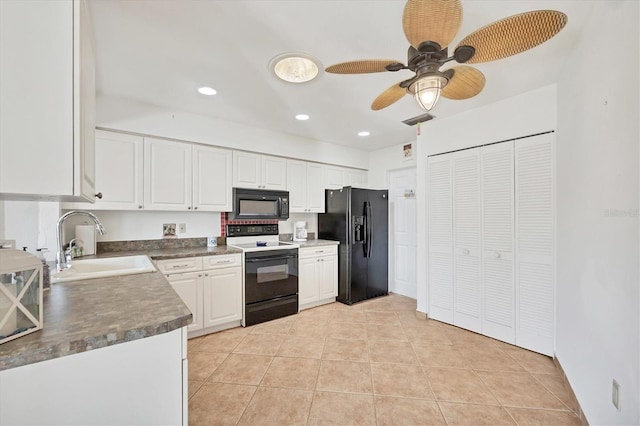 kitchen with sink, light tile patterned floors, ceiling fan, black appliances, and white cabinets