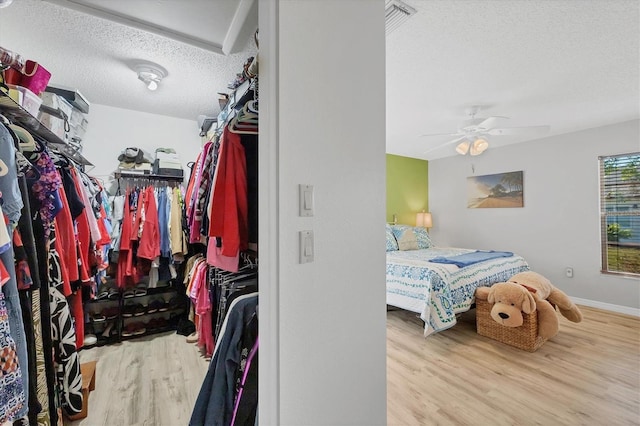 interior space featuring ceiling fan and light hardwood / wood-style floors