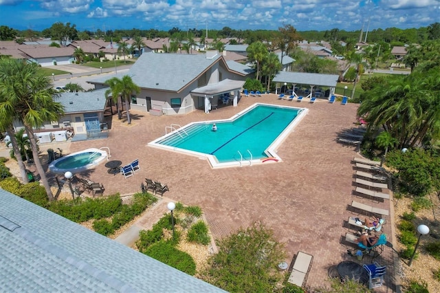 view of swimming pool featuring a patio area