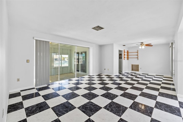 unfurnished room featuring ceiling fan