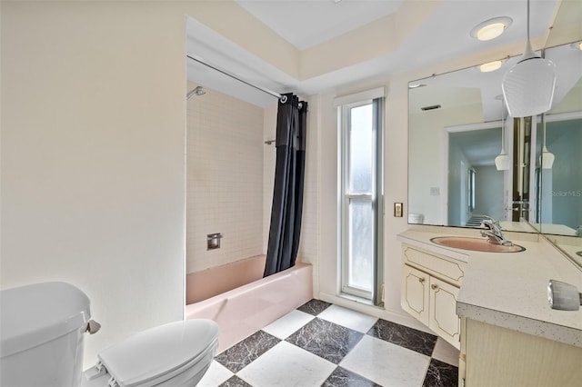 full bathroom featuring shower / bathtub combination with curtain, vanity, and toilet