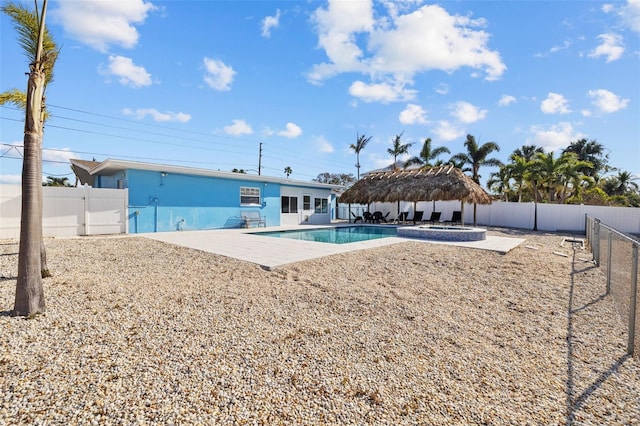 view of pool with a gazebo and a patio area