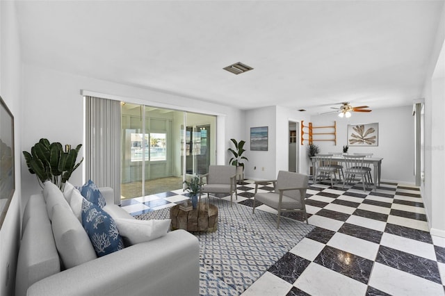 living room featuring ceiling fan