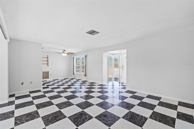 spare room with ceiling fan