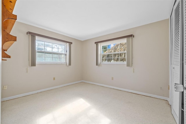 unfurnished bedroom featuring a closet