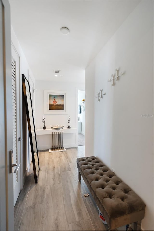 hall featuring light hardwood / wood-style flooring