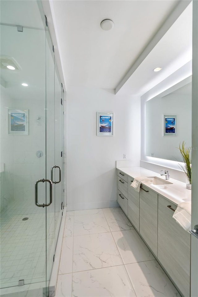 bathroom with vanity and walk in shower