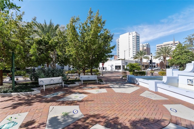 view of home's community with a patio area