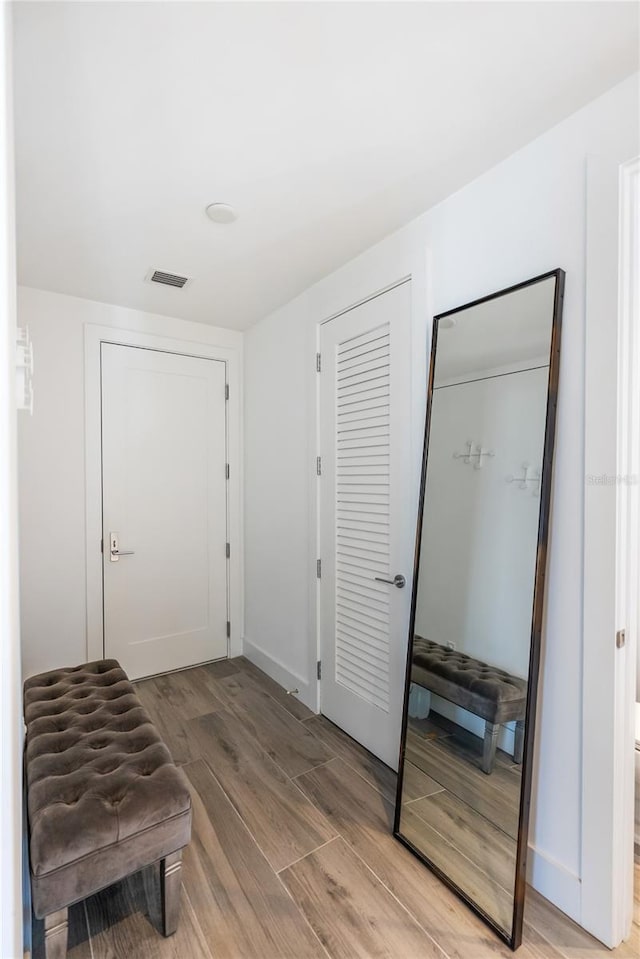 foyer entrance featuring hardwood / wood-style floors