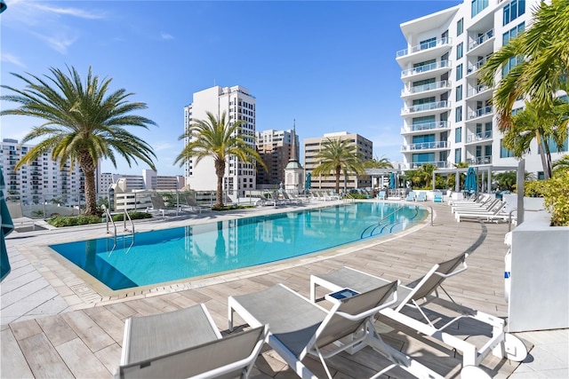 view of swimming pool featuring a patio area