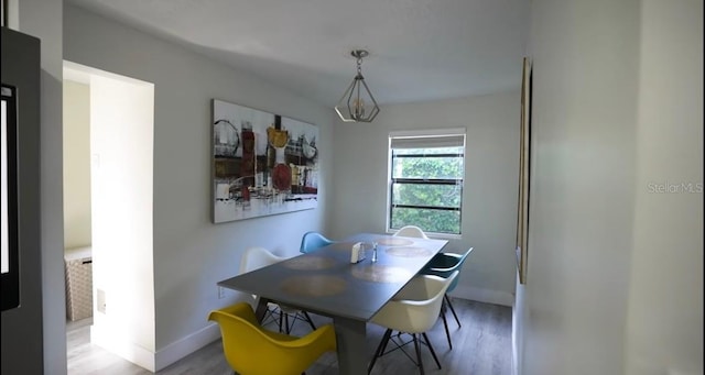 dining area featuring hardwood / wood-style floors