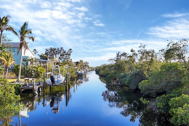 property view of water featuring a boat dock