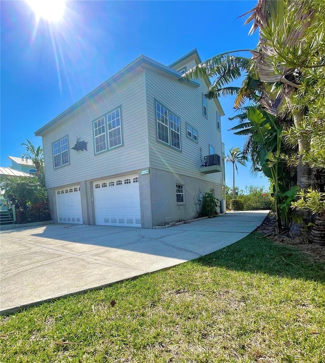 view of property exterior featuring a garage