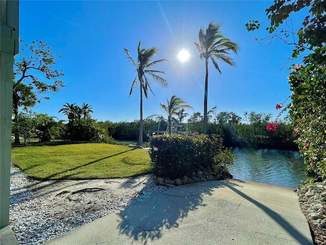 view of home's community with a water view