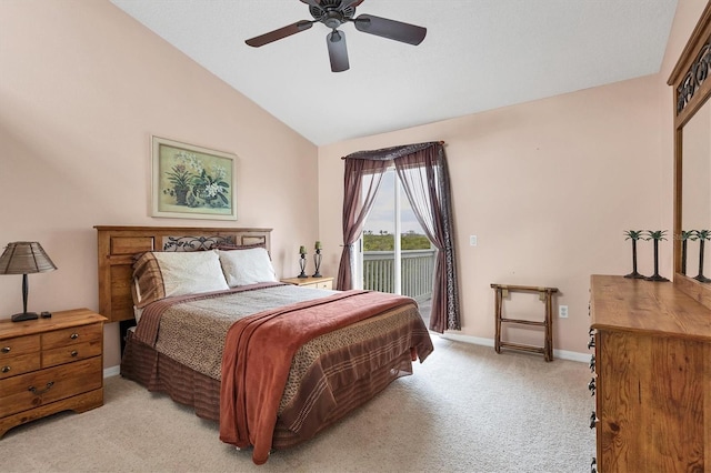 bedroom featuring ceiling fan, lofted ceiling, access to exterior, and light carpet