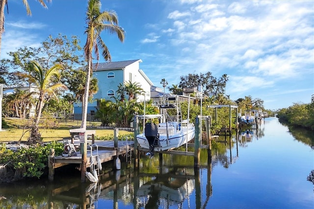 dock area featuring a water view