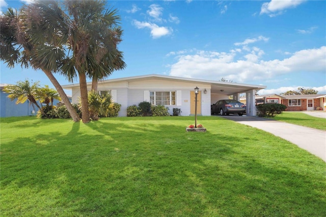 ranch-style house with a front lawn and a carport