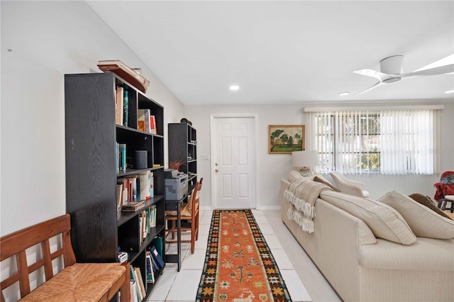 living room with light tile patterned flooring and ceiling fan