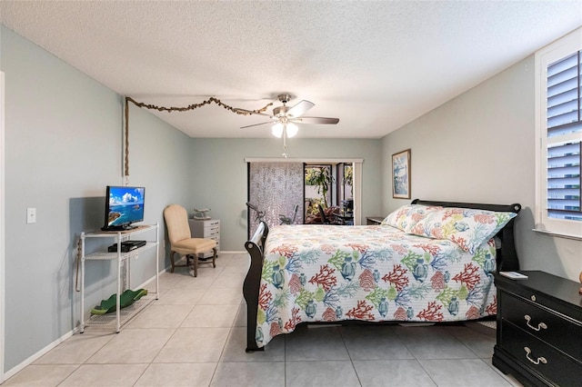 bedroom with light tile patterned floors, a textured ceiling, access to outside, and ceiling fan