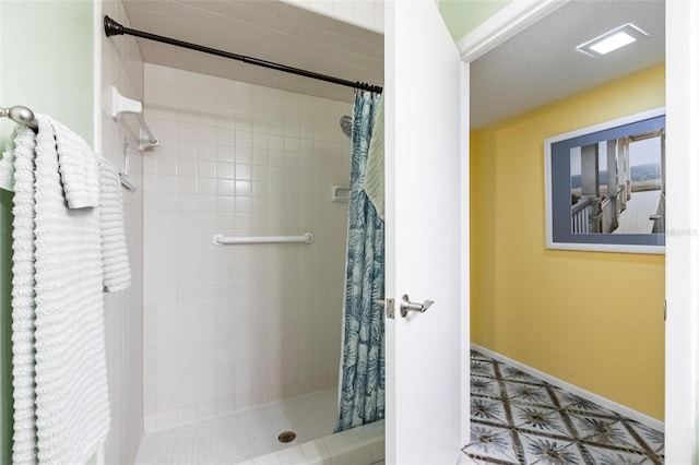 bathroom with a shower with curtain