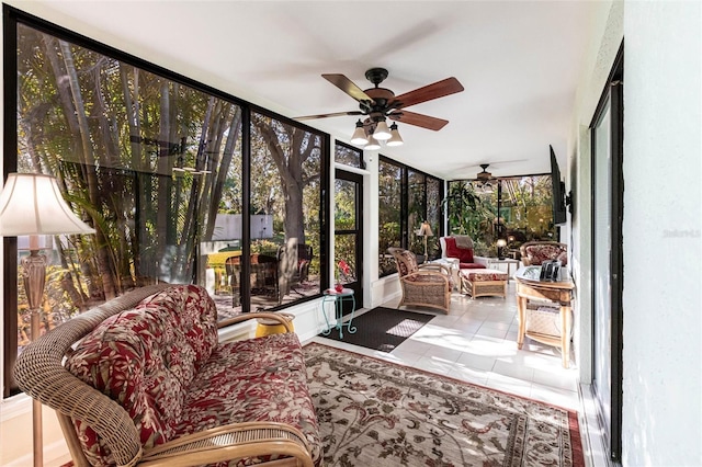 sunroom with ceiling fan