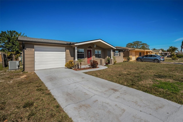 single story home featuring a garage, a front yard, and central air condition unit