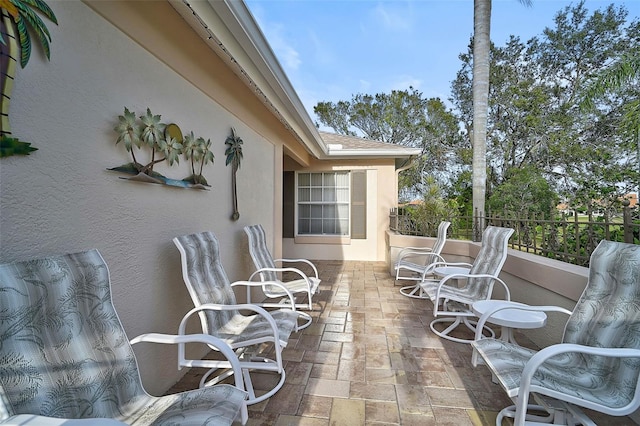 view of patio / terrace with a balcony