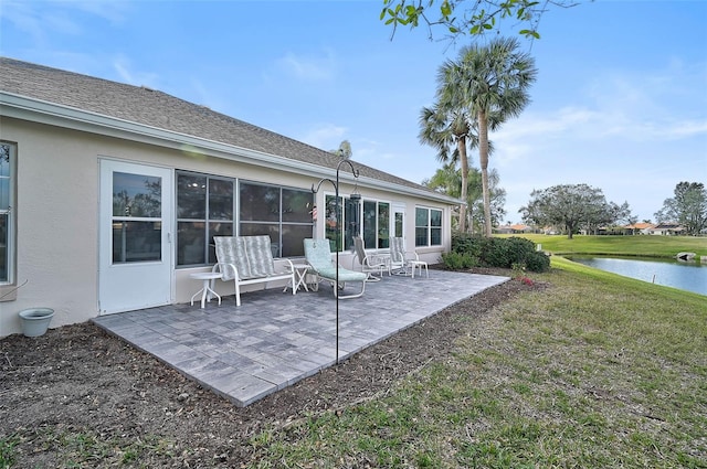 exterior space with a water view